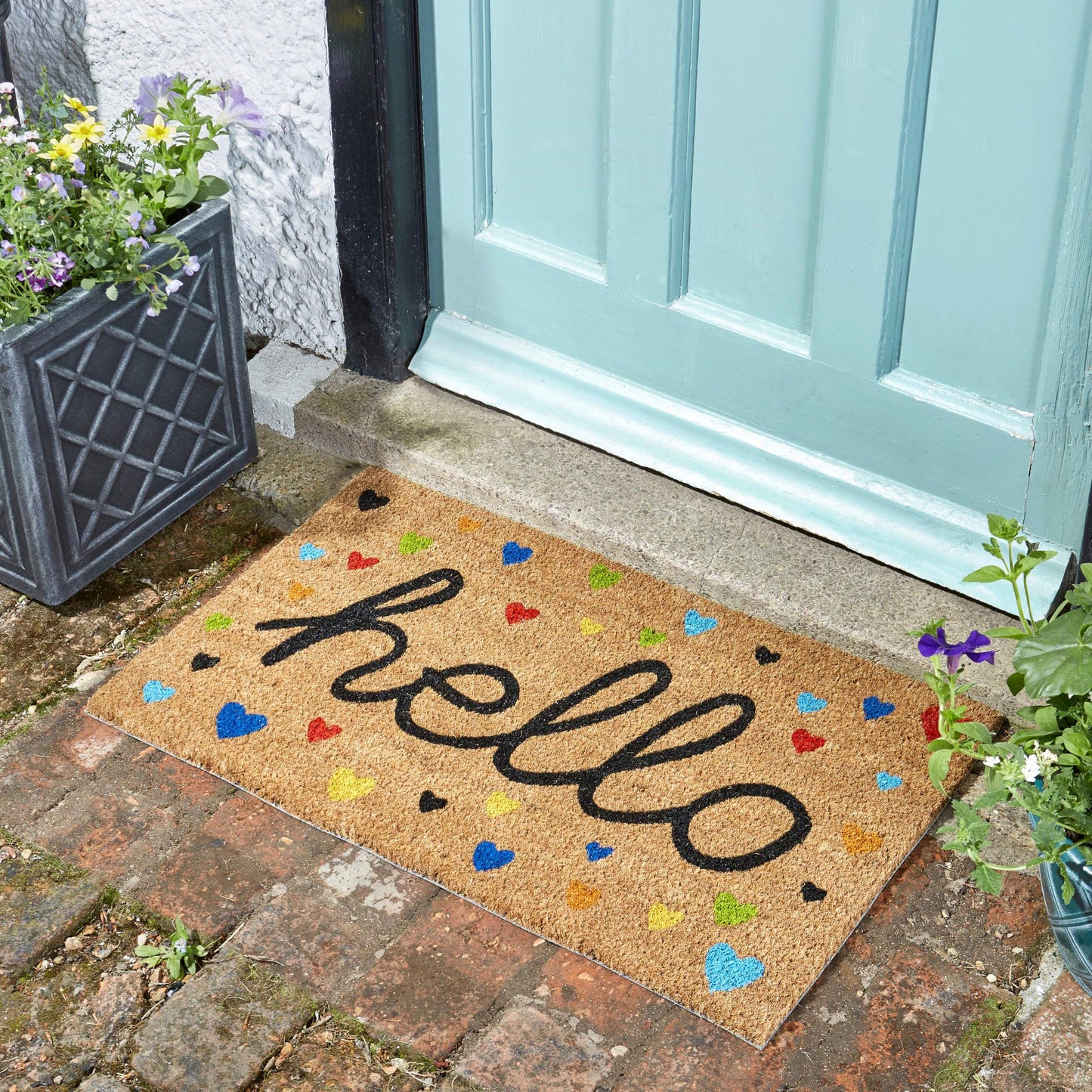 Rohožka Hearty Hello zo série Décoir pred vchodovými dverami